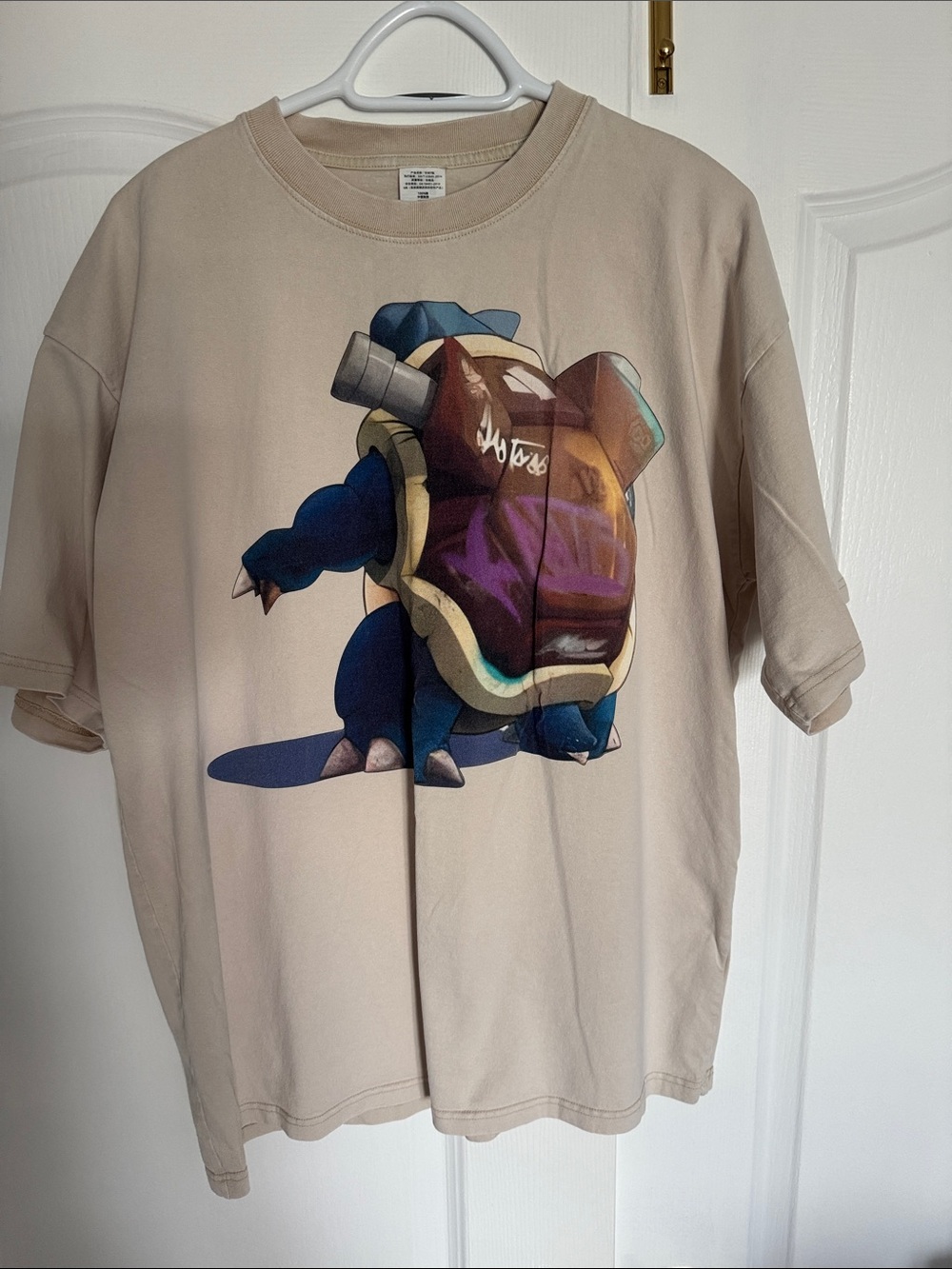 Pokemon men Beige Graphic T-Shirt with Blastoise Print